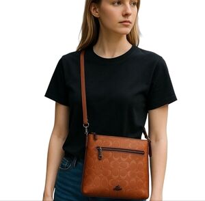 Coach Brown Crossbody Bag with Embossed Design